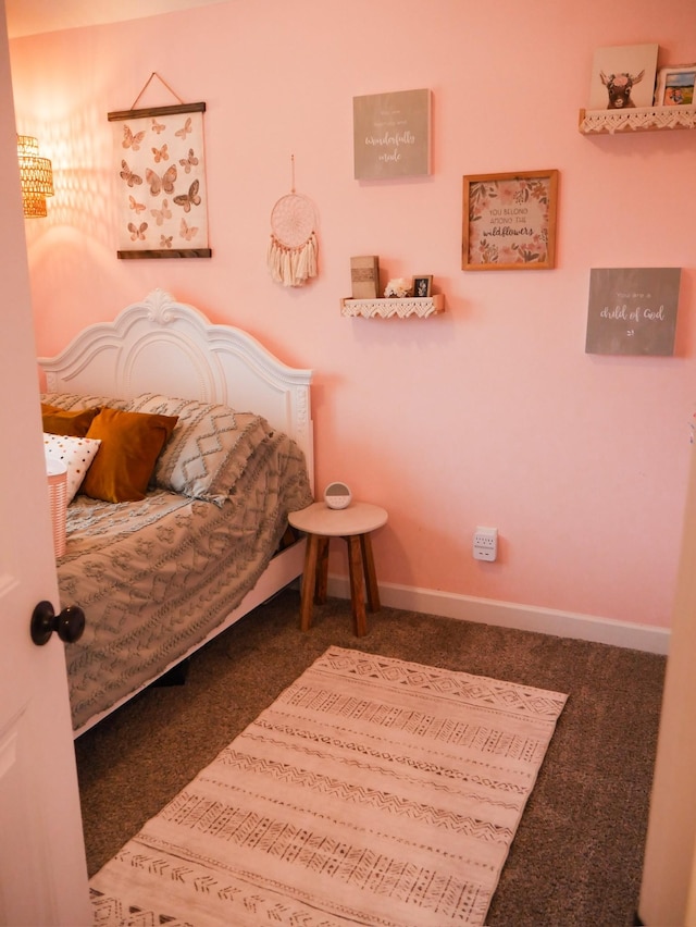 bedroom with dark carpet