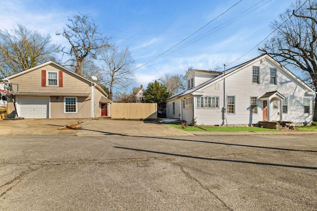 view of property exterior with a garage