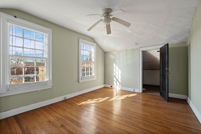 bonus room with ceiling fan, lofted ceiling, and hardwood / wood-style floors