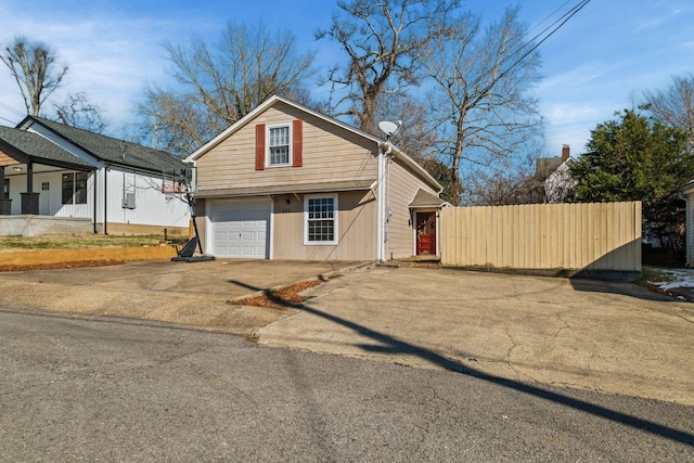 view of front of property featuring a garage