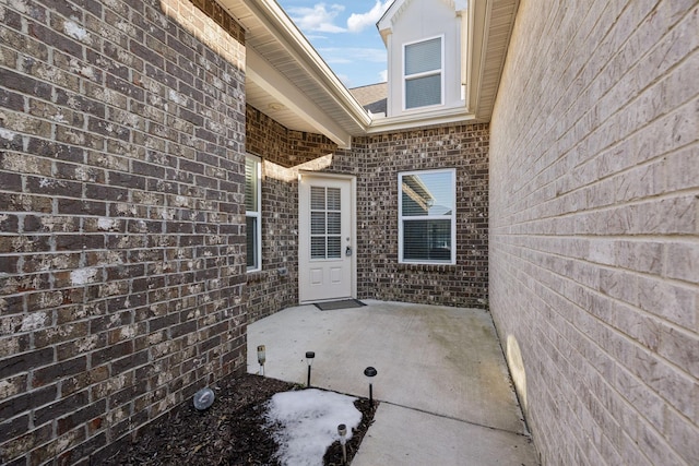 doorway to property featuring a patio area