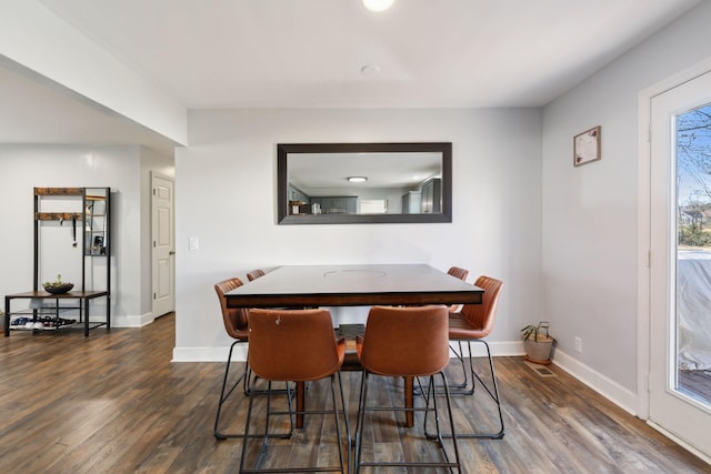 dining room featuring dark hardwood / wood-style floors