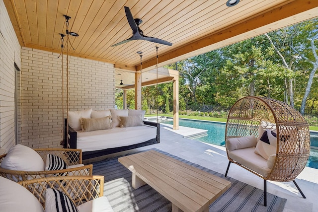 exterior space featuring ceiling fan and an outdoor hangout area