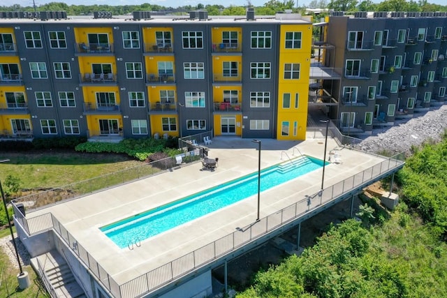 view of swimming pool with a patio