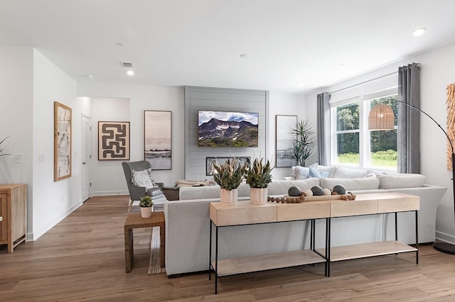 living room with hardwood / wood-style flooring