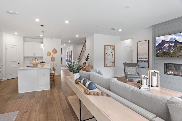 living room featuring light hardwood / wood-style flooring