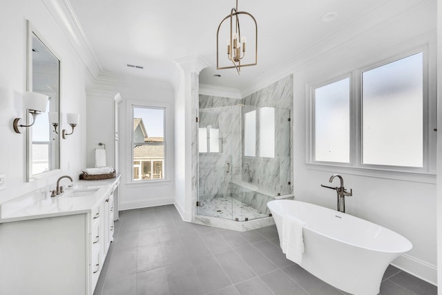 bathroom featuring an inviting chandelier, ornamental molding, separate shower and tub, and vanity