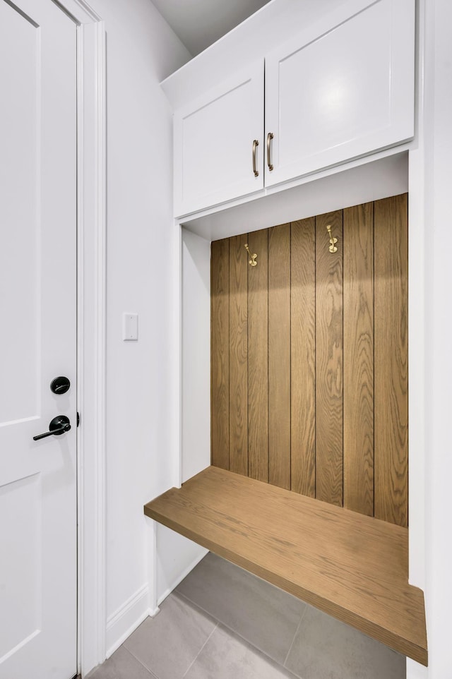 mudroom with tile patterned floors