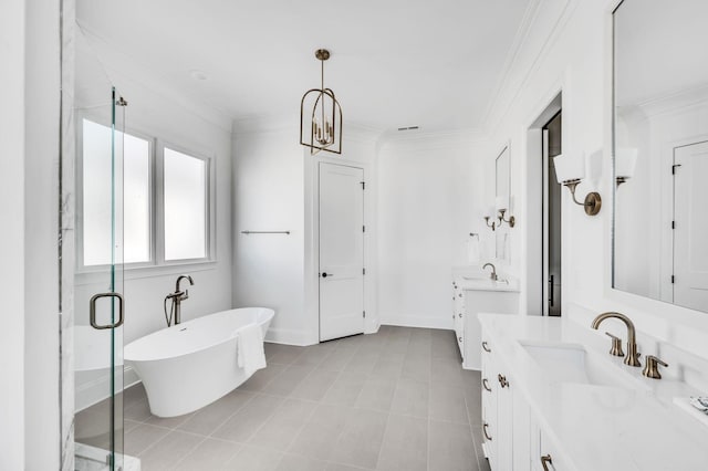 bathroom with vanity, a notable chandelier, independent shower and bath, and crown molding