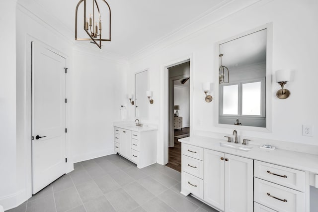 bathroom with crown molding, tile patterned floors, vanity, and a notable chandelier