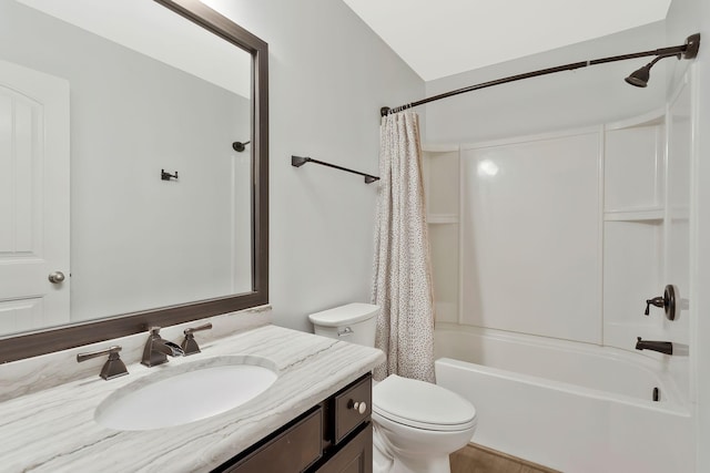 full bathroom with vanity, toilet, and shower / bath combo with shower curtain