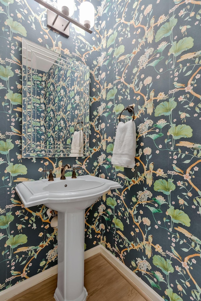 bathroom with wood-type flooring