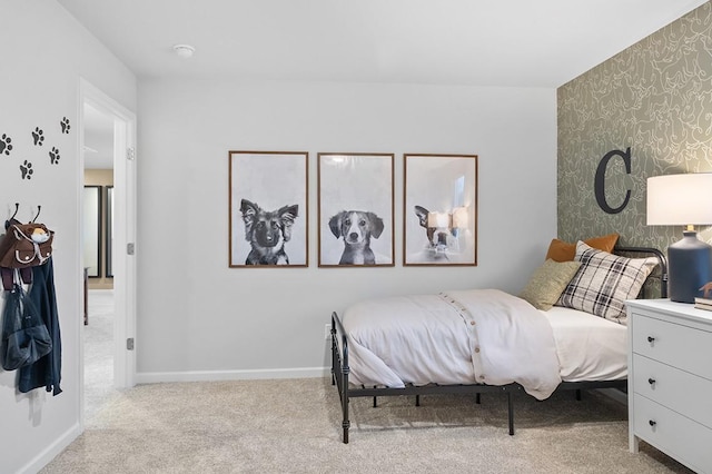 bedroom featuring light carpet