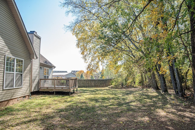 view of yard with a deck