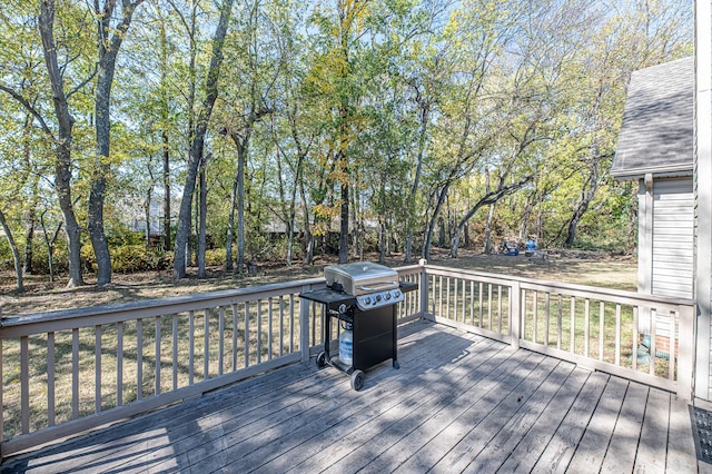 deck featuring a grill