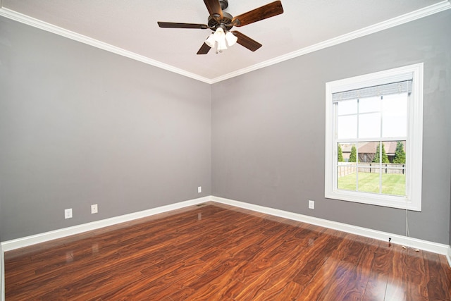 spare room with ceiling fan, baseboards, dark wood-style flooring, and ornamental molding