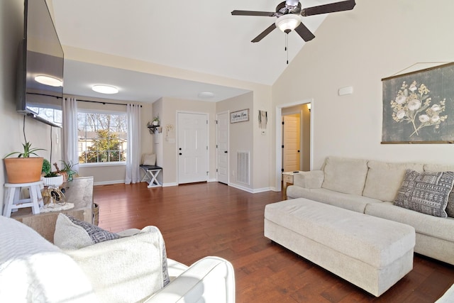 living room featuring vaulted ceiling, dark wood-type flooring, and ceiling fan