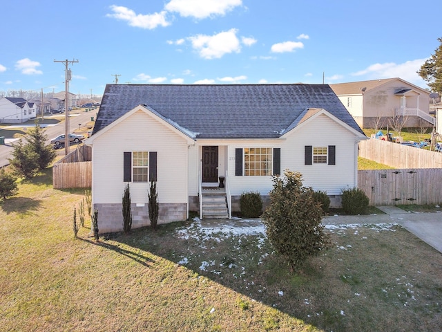 ranch-style house with a front lawn