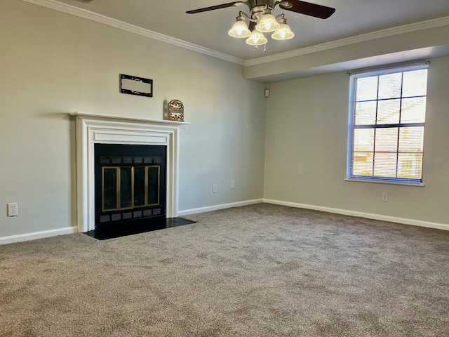 unfurnished living room featuring carpet floors, ceiling fan, and crown molding