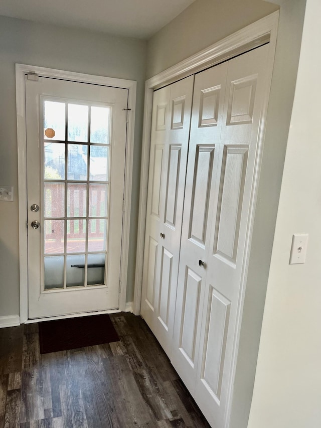 doorway featuring dark hardwood / wood-style floors