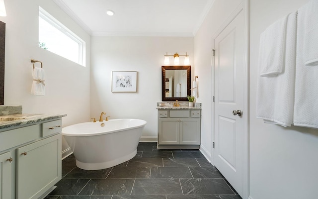 bathroom with vanity, a washtub, and ornamental molding