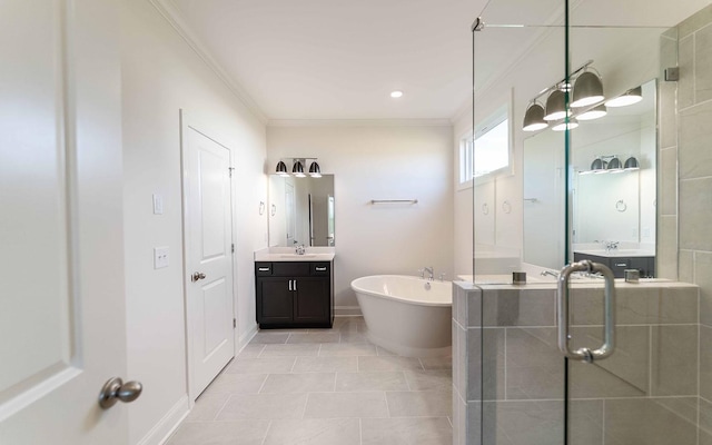 7934 Pine St, Fairview, TN 37062 - bathroom featuring ornamental molding, a freestanding tub, tile patterned floors, two vanities, and baseboards