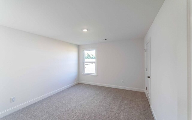 7934 Pine St, Fairview, TN 37062 - empty room with baseboards, light colored carpet, and recessed lighting