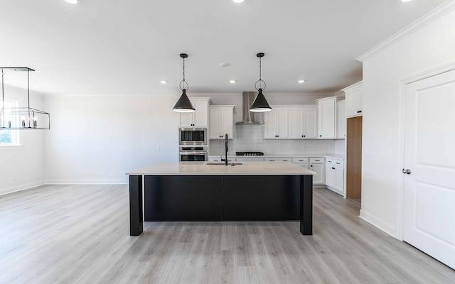 7934 Pine St, Fairview, TN 37062 - kitchen with wall chimney range hood, light countertops, white cabinetry, a chandelier, and recessed lighting