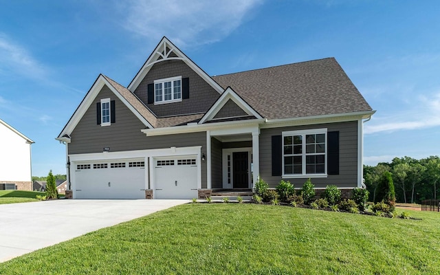 7934 Pine St, Fairview, TN 37062 - craftsman inspired home with concrete driveway, a front lawn, roof with shingles, and a garage
