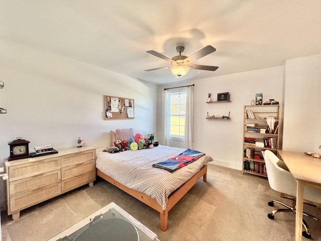 bedroom featuring ceiling fan and carpet floors