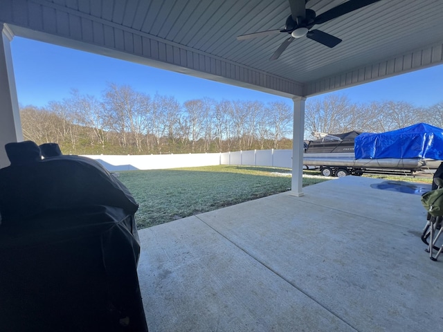 view of patio with ceiling fan and area for grilling