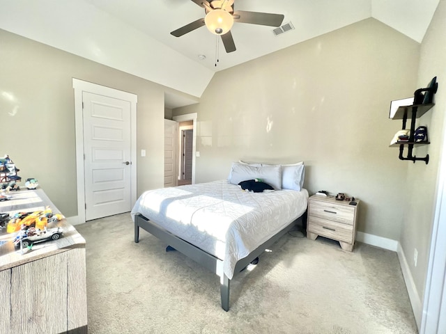 carpeted bedroom featuring ceiling fan and lofted ceiling