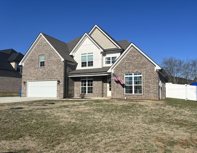 craftsman-style house with a front yard and a garage