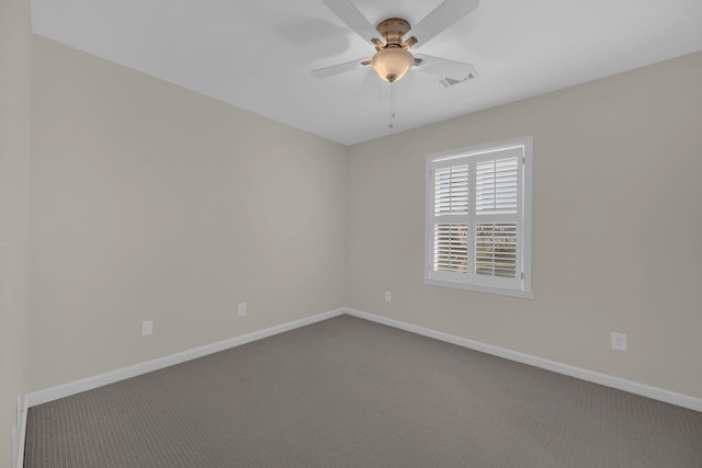 empty room with ceiling fan and carpet flooring