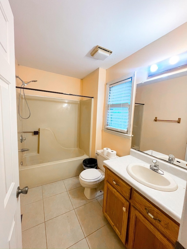 full bathroom featuring toilet, tile patterned flooring, bathing tub / shower combination, and vanity