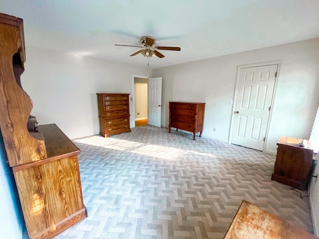 bedroom featuring ceiling fan and light parquet flooring