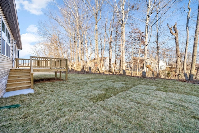 view of yard with a wooden deck