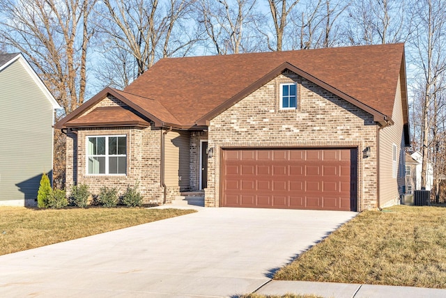 view of front facade featuring a front lawn and a garage