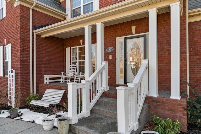 entrance to property with covered porch