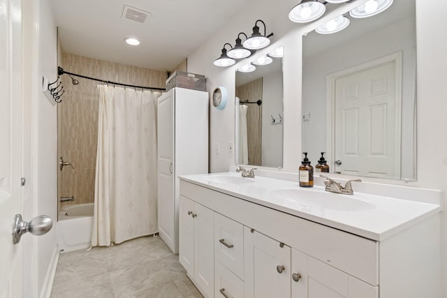 bathroom with vanity and shower / bathtub combination with curtain