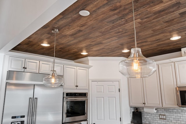 kitchen featuring wood ceiling, stainless steel appliances, and pendant lighting