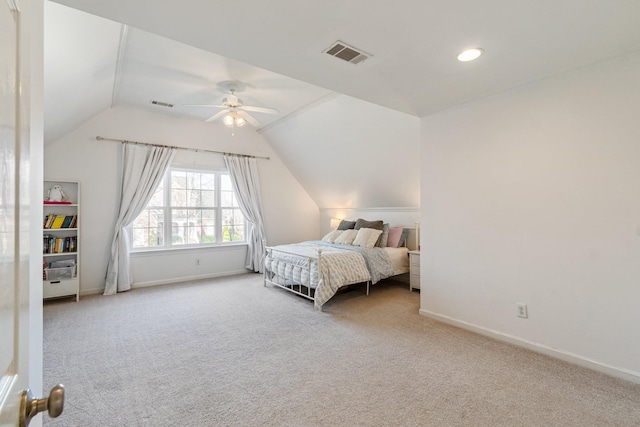 bedroom with ceiling fan, carpet, and lofted ceiling