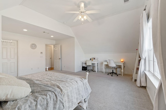 bedroom with lofted ceiling, light carpet, multiple windows, and ceiling fan