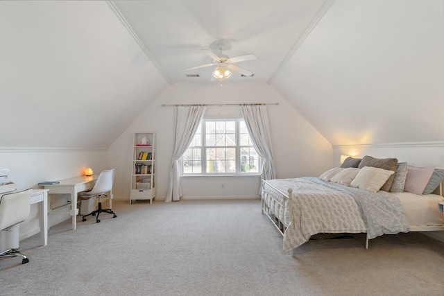 carpeted bedroom featuring ceiling fan and vaulted ceiling