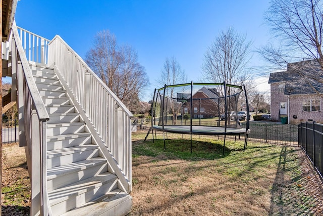 view of yard with a trampoline