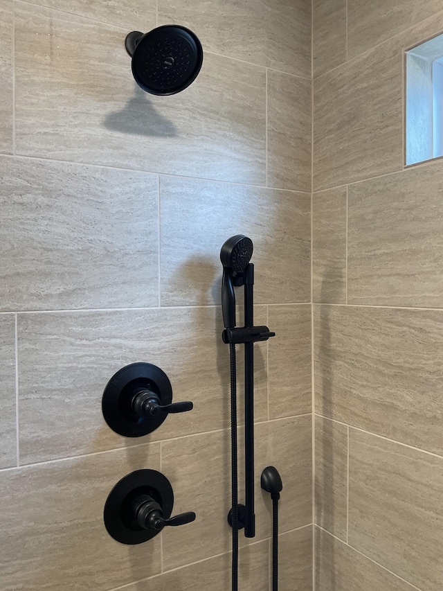 room details with a tile shower