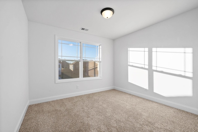 empty room featuring carpet floors