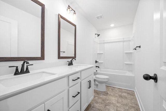 full bathroom featuring toilet, vanity, and shower / bathing tub combination