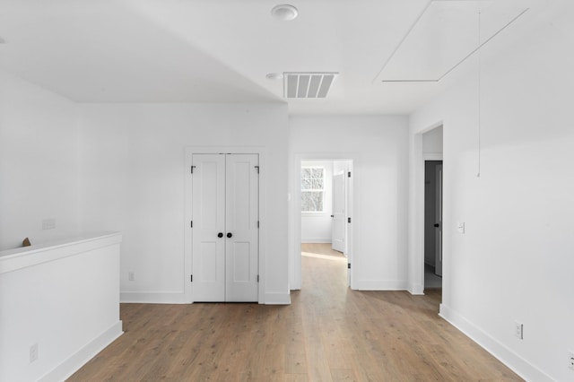 empty room featuring hardwood / wood-style floors