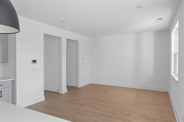 empty room featuring light hardwood / wood-style floors